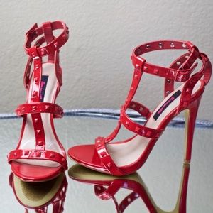 Lady in Red spiked Heels